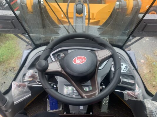 vô lăng máy xúc lật cần dài wl935la
